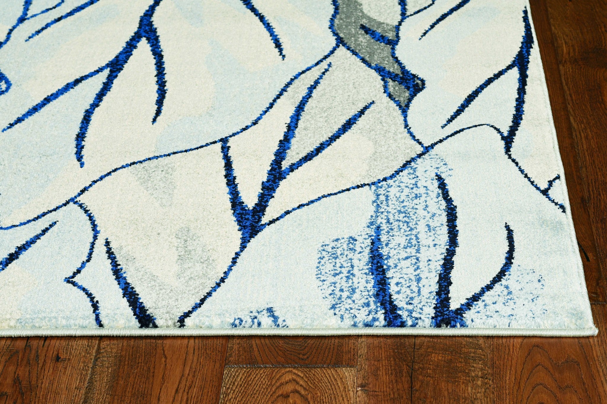8'X11' Grey Navy Machine Woven Oversized Leaves Indoor Area Rug
