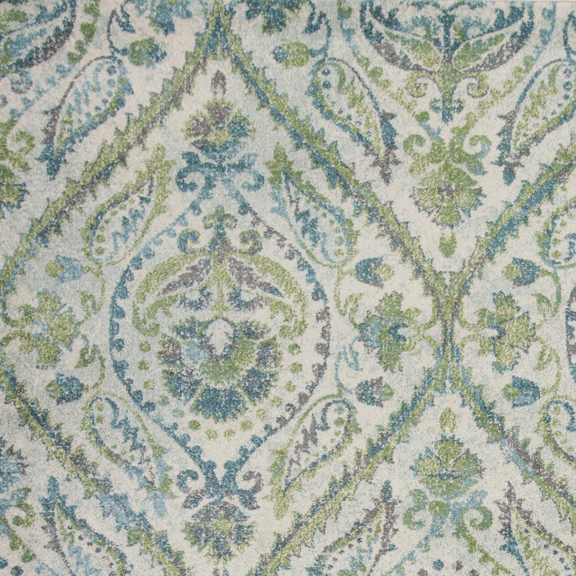 7' X 10' Polypropylene Ivory Or Teal Area Rug