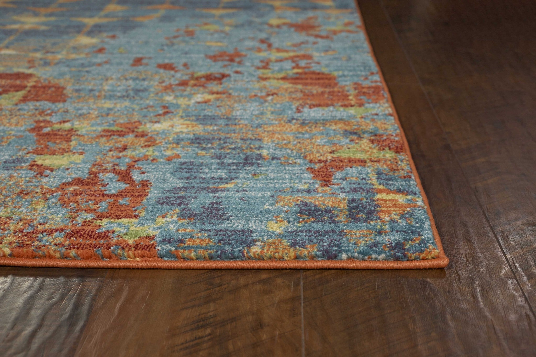 7' X 10' Polypropylene Blue Or Coral Area Rug