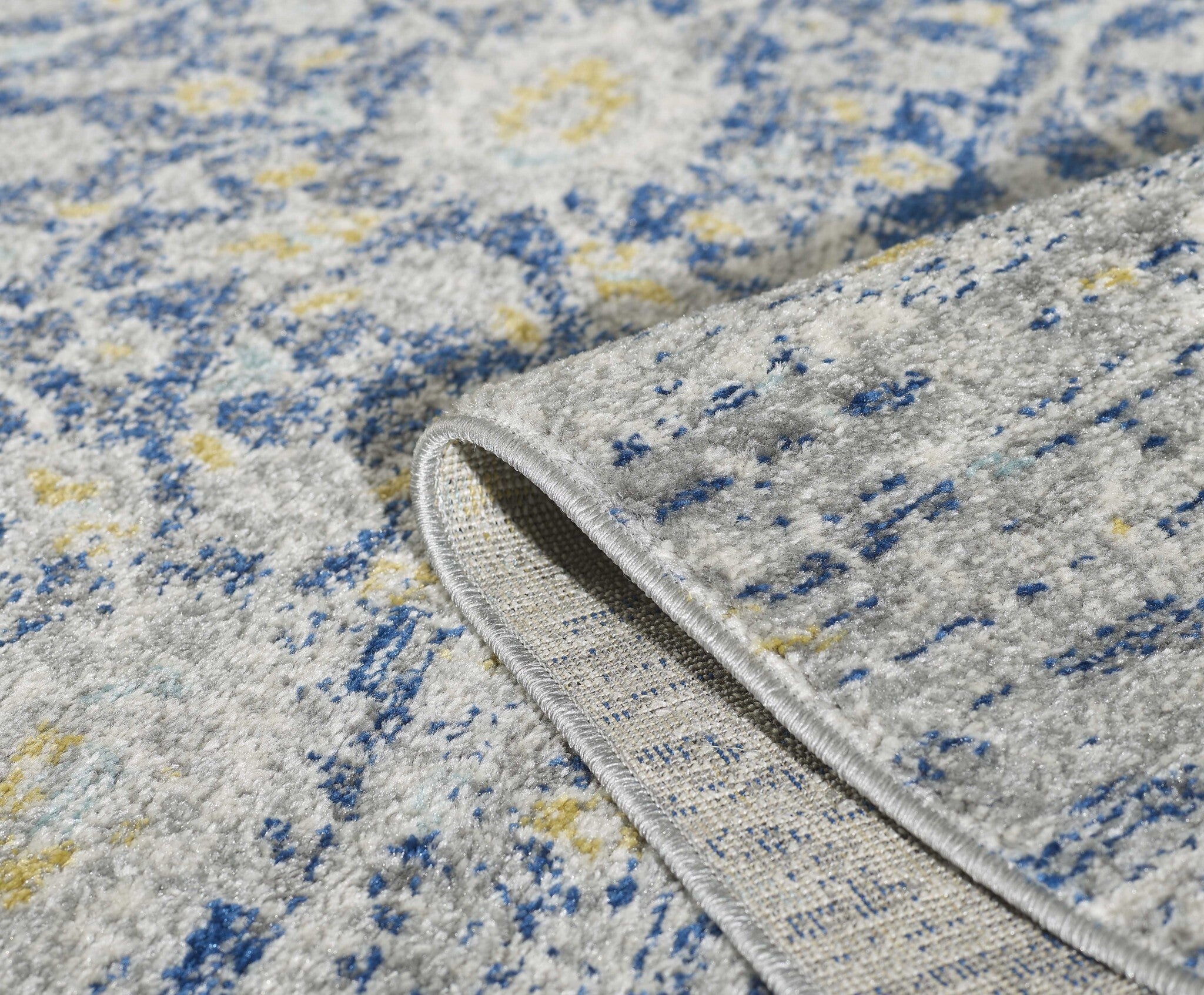 9'X12' Blue Grey Machine Woven Distressed Floral Indoor Area Rug