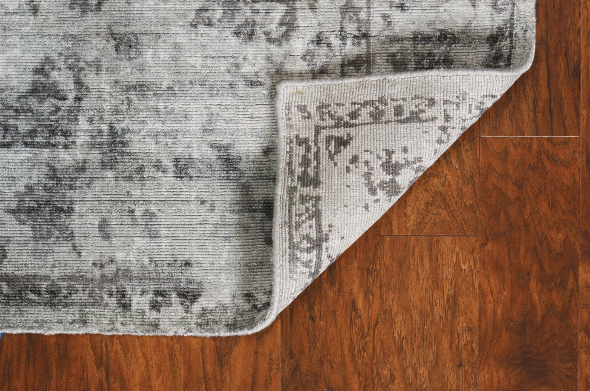 9'X12' Grey Hand Loomed Distressed Floral Indoor Area Rug