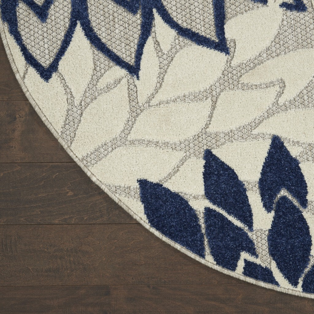4' Round Ivory And Navy Indoor Outdoor Area Rug
