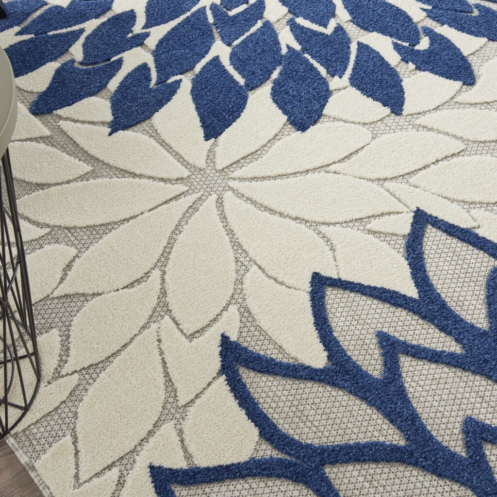 8' X 11' Ivory And Navy Indoor Outdoor Area Rug