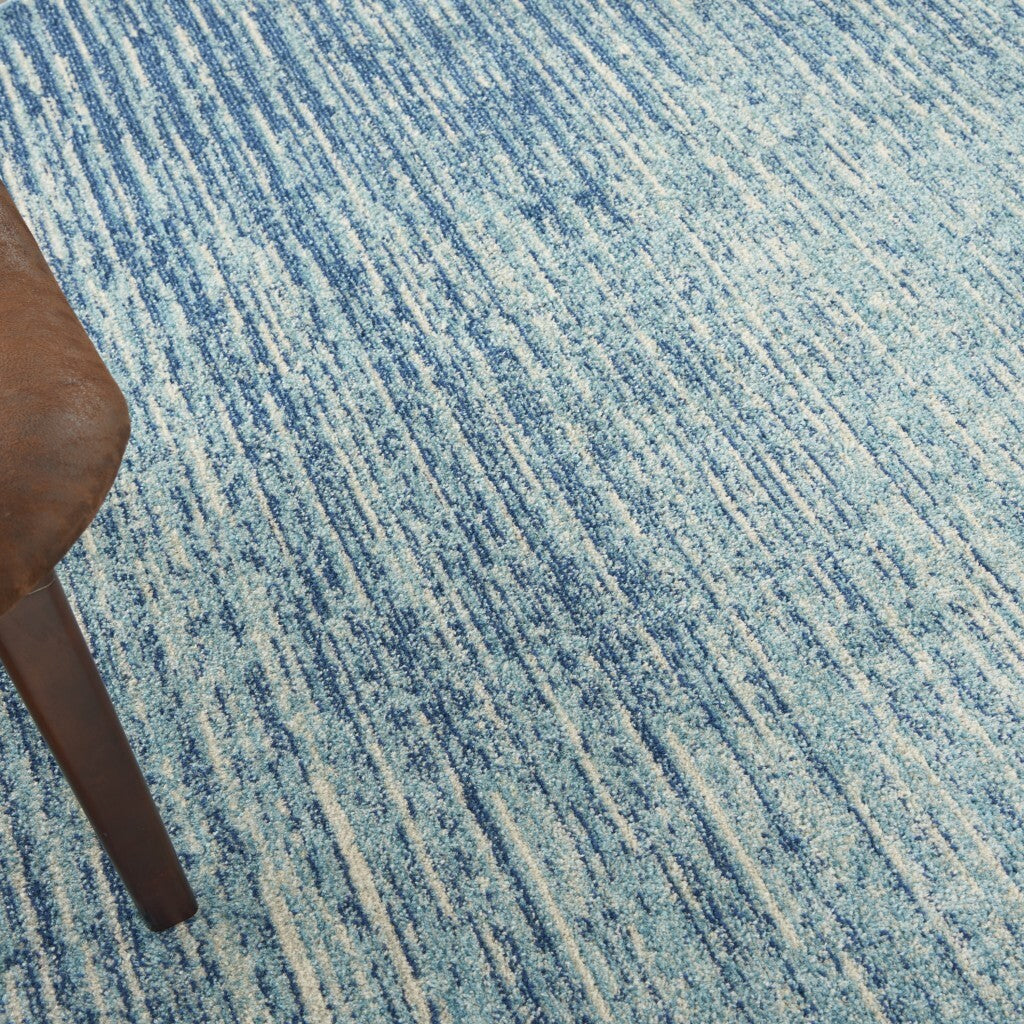 8' Round Navy And Light Blue Abstract Area Rug