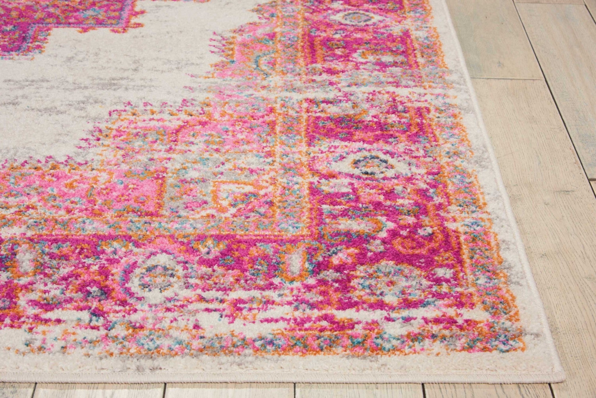 7' X 10' Ivory And Fuchsia Distressed Area Rug