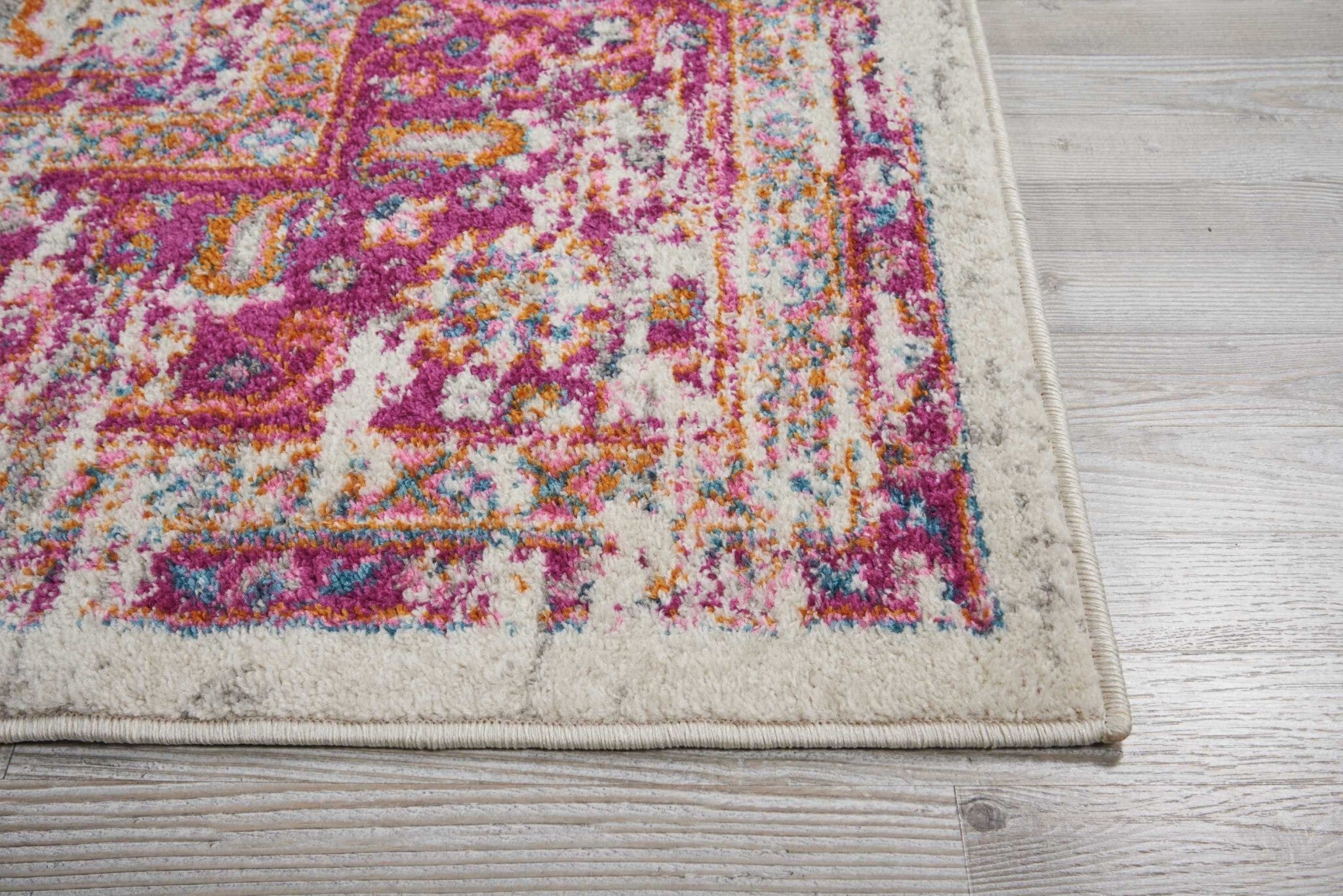 8' X 10' Ivory And Fuchsia Distressed Area Rug