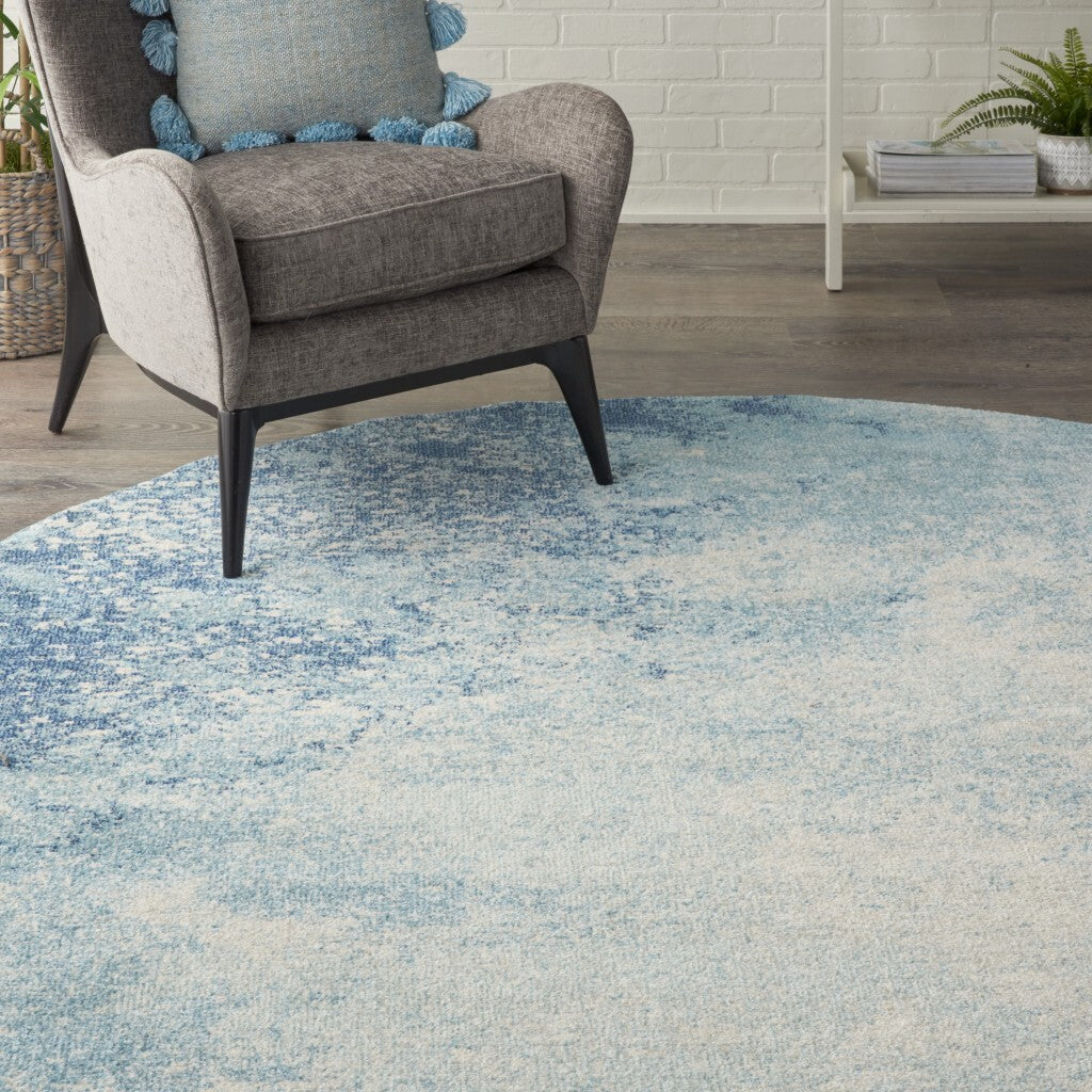 8' Round Light Blue And Ivory Abstract Sky Area Rug