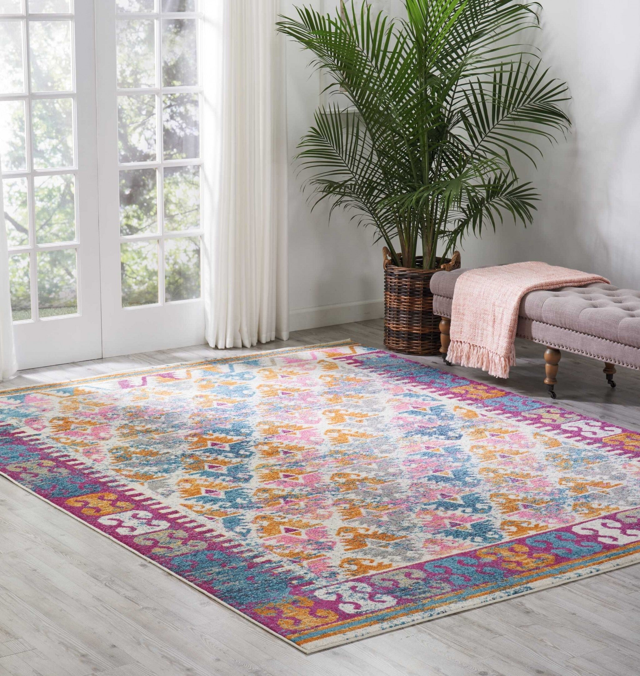 8' X 10' Ivory And Magenta Tribal Pattern Area Rug
