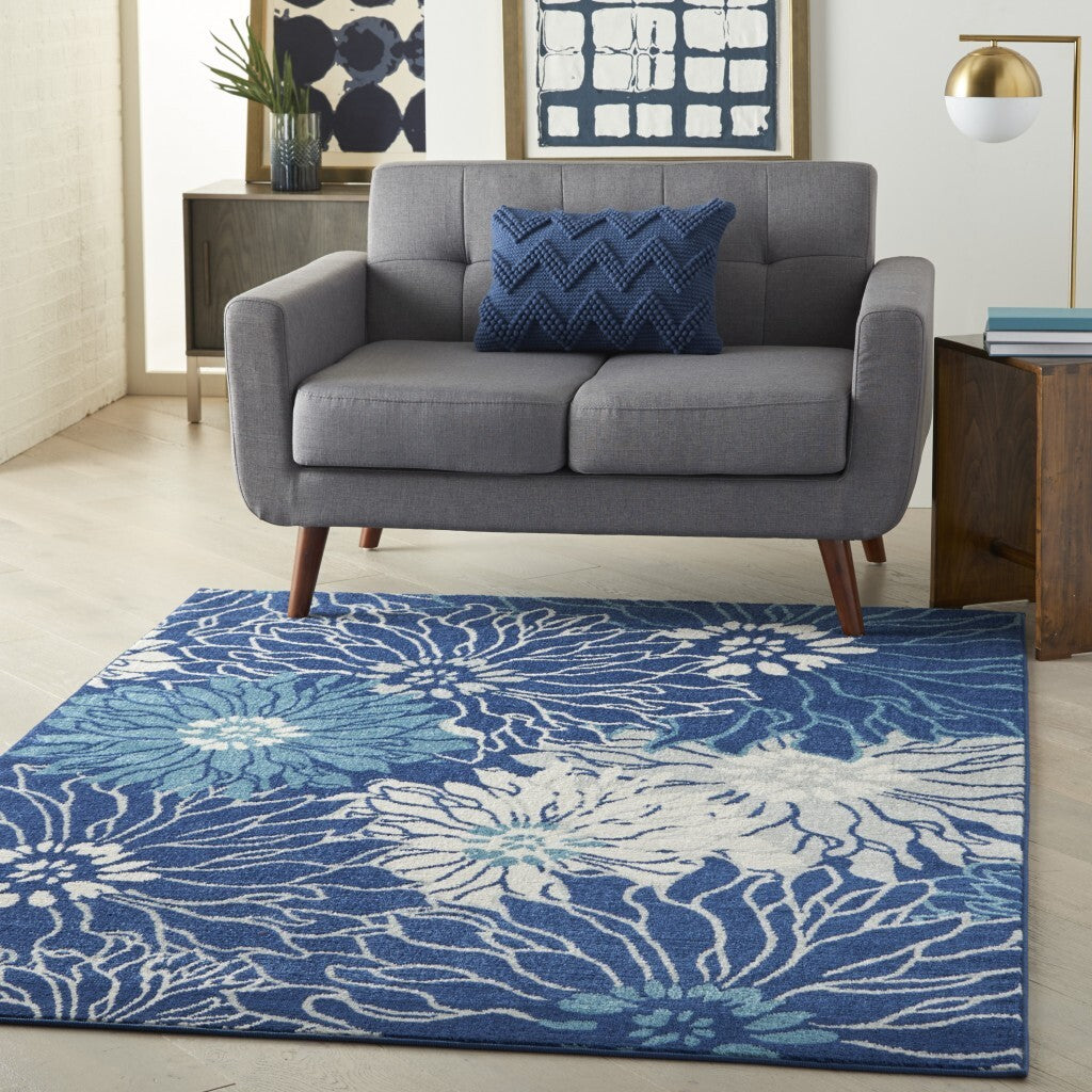 5' X 7' Navy And Ivory Floral Area Rug