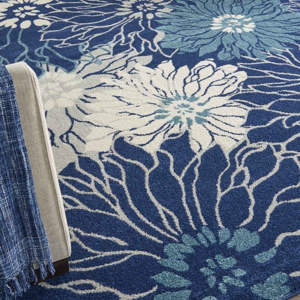 7' X 10' Navy And Ivory Floral Area Rug