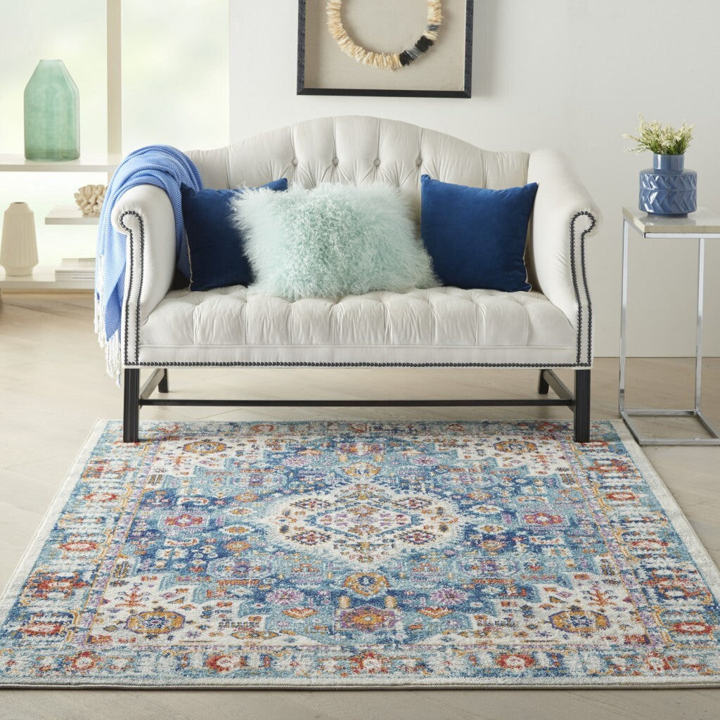 4' X 6' Ivory And Blue Floral Motifs Area Rug