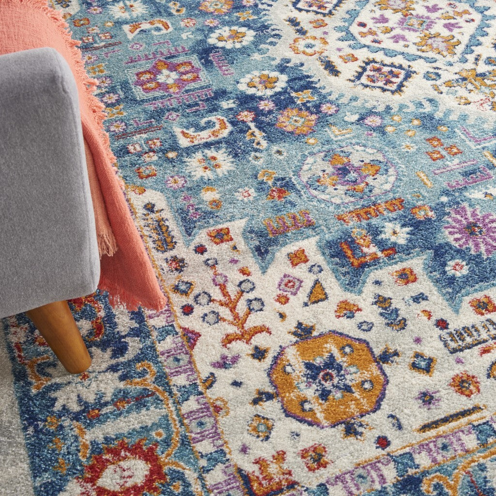 8' X 10' Ivory And Blue Floral Motifs Area Rug