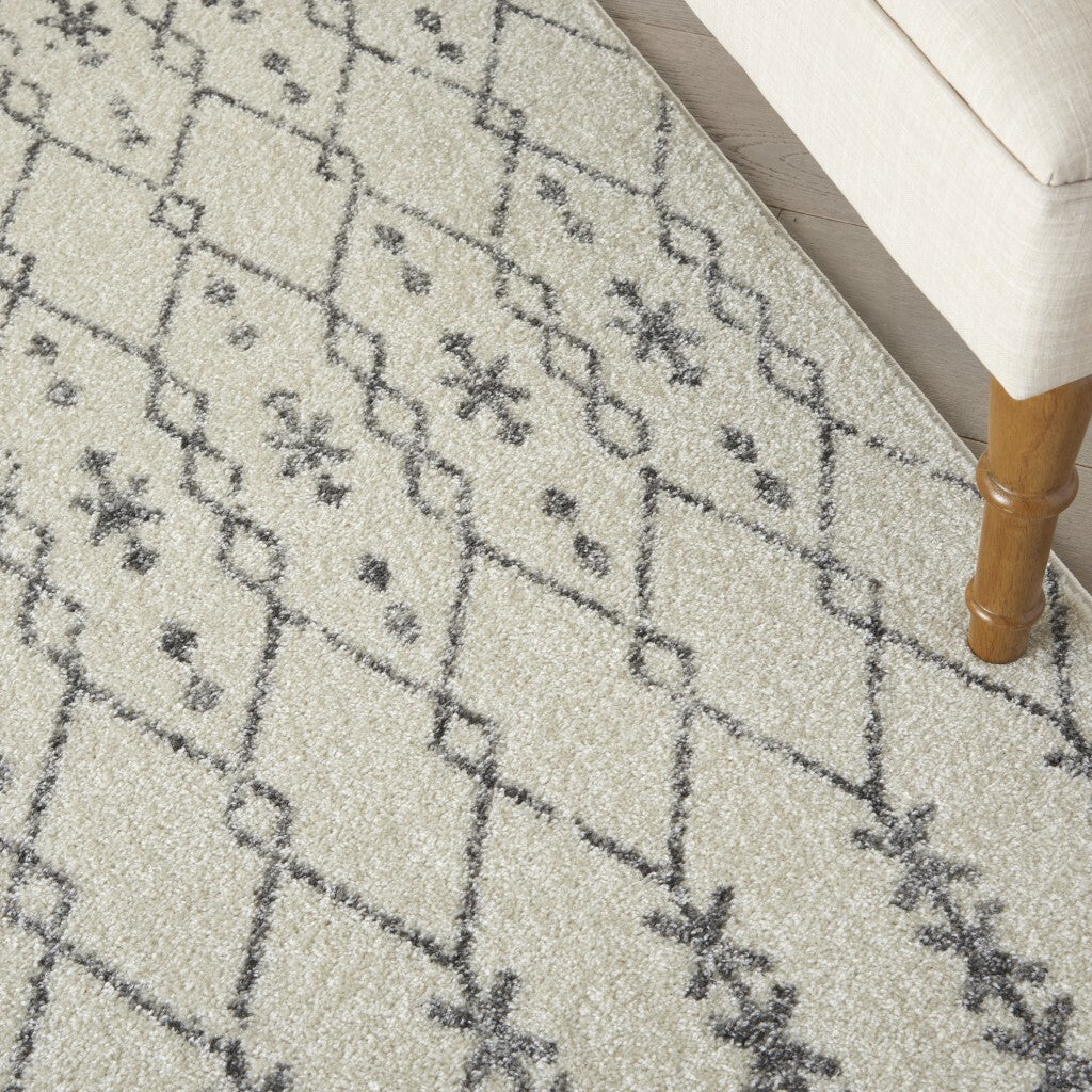 5' X 7' Ivory And Gray Geometric Area Rug