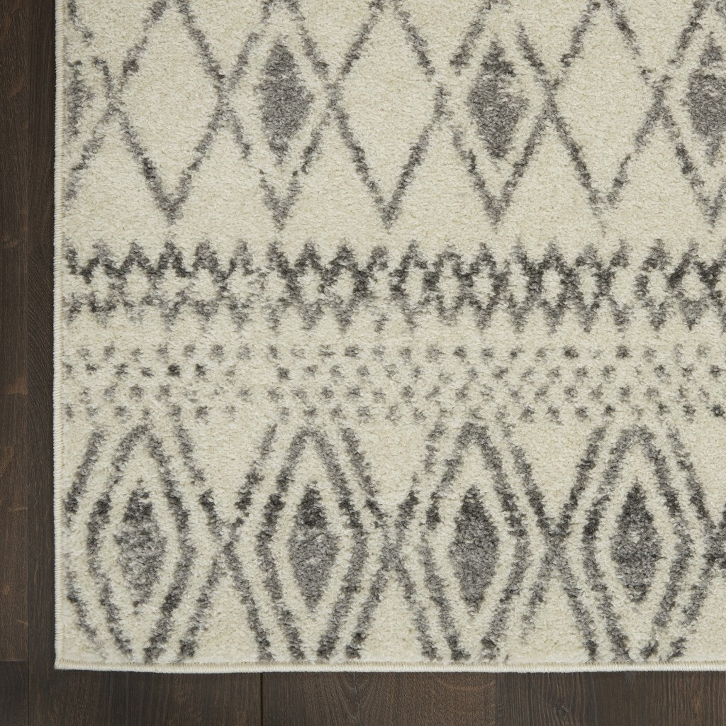 5' X 7' Ivory And Gray Berber Pattern Area Rug