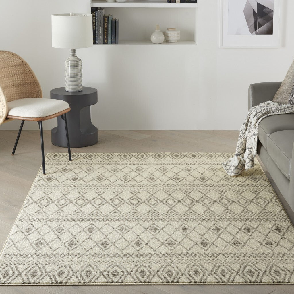 5' X 7' Ivory And Gray Berber Pattern Area Rug