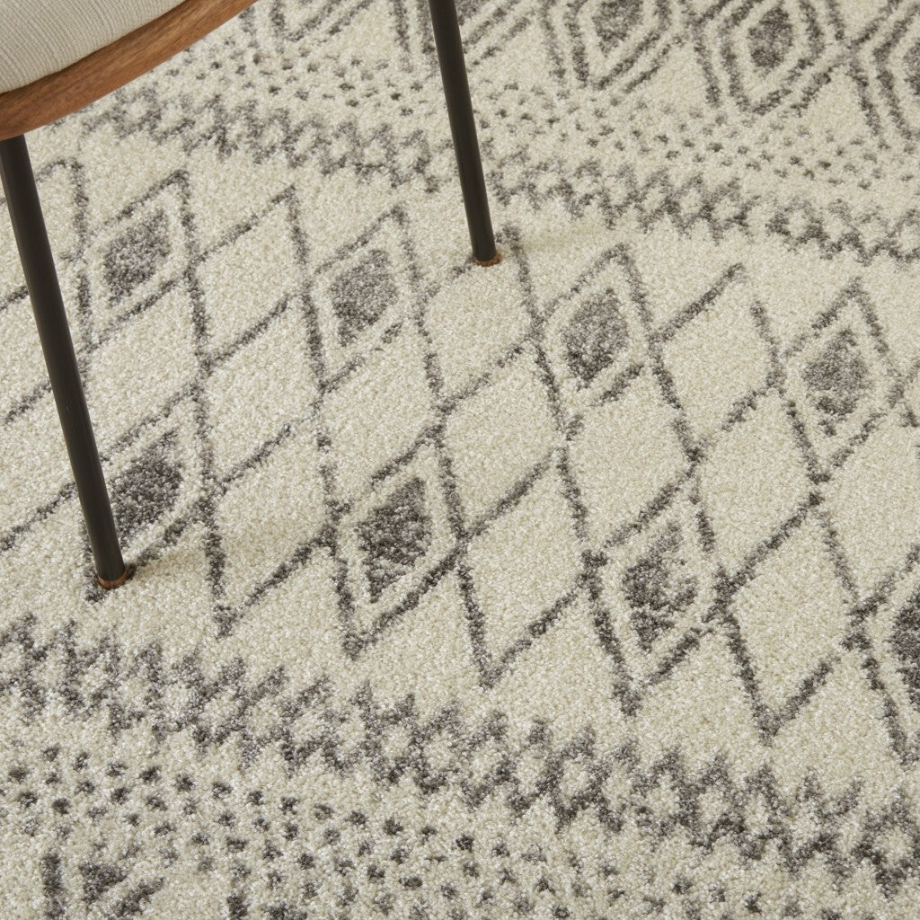 5' X 7' Ivory And Gray Berber Pattern Area Rug