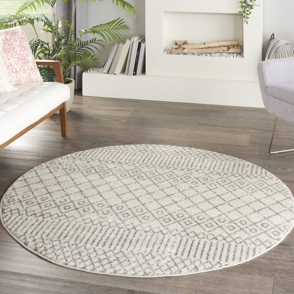 4' Round Ivory And Gray Geometric Area Rug