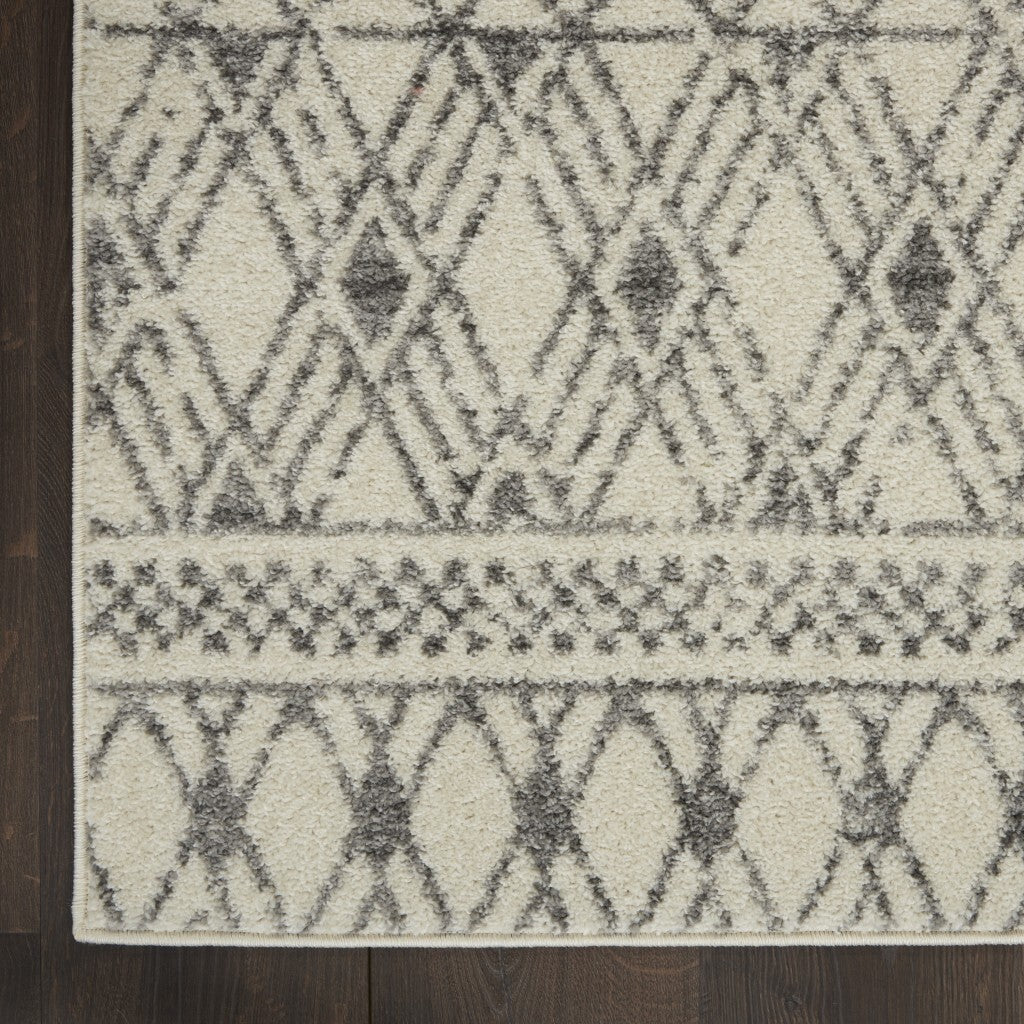5' X 7' Ivory And Gray Geometric Area Rug