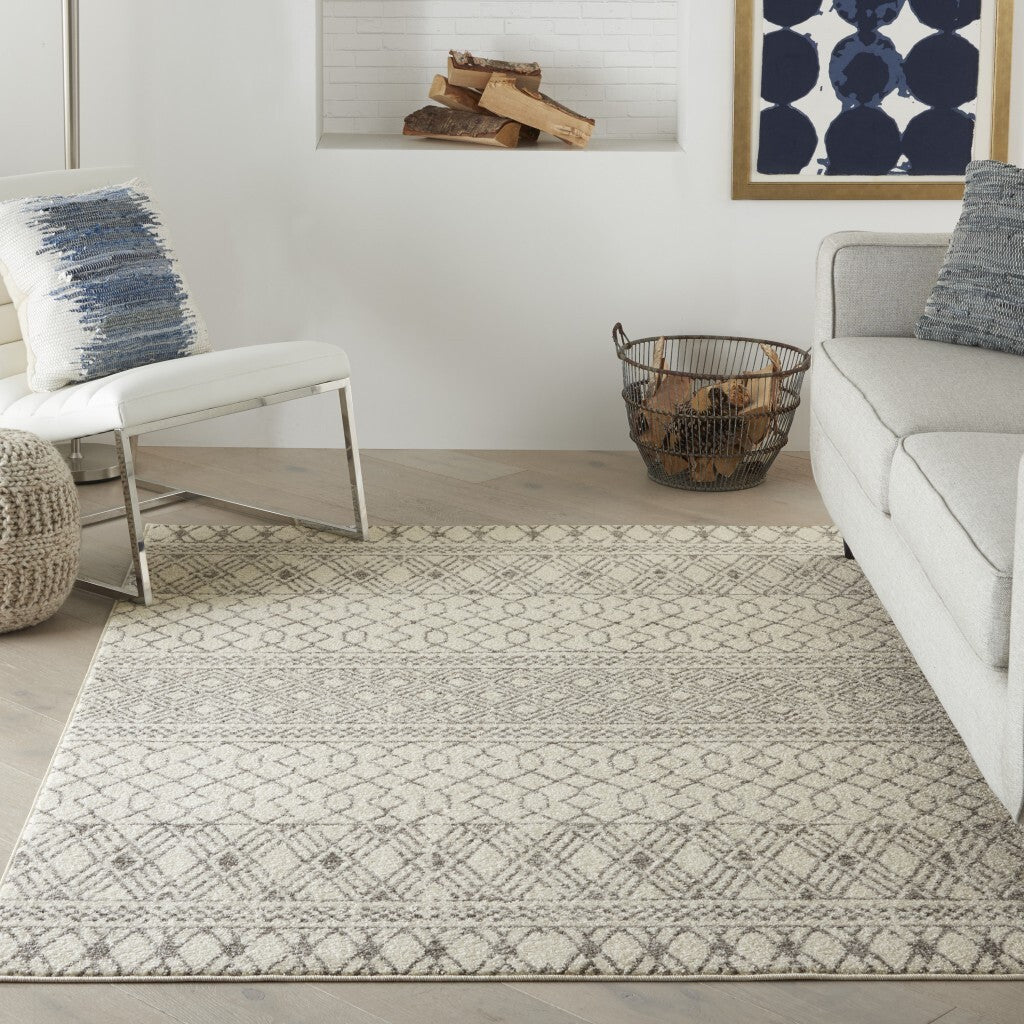 5' X 7' Ivory And Gray Geometric Area Rug