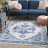 5' X 7' Ivory And Blue Persian Medallion Area Rug