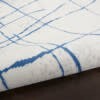 6' X 9' Ivory And Blue Irregular Grids Area Rug