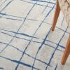 6' X 9' Ivory And Blue Irregular Grids Area Rug