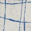 6' X 9' Ivory And Blue Irregular Grids Area Rug