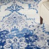 6' X 9' Ivory And Blue Medallion Area Rug