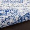 4' X 6' Ivory And Navy Geometric Area Rug