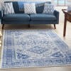4' X 6' Ivory And Navy Geometric Area Rug