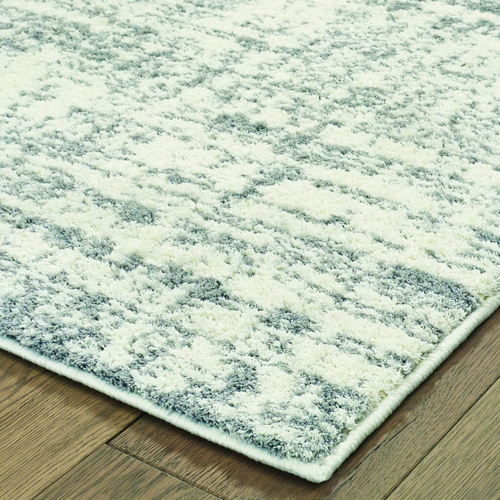 7'X10' Ivory And Gray Abstract Strokes Area Rug