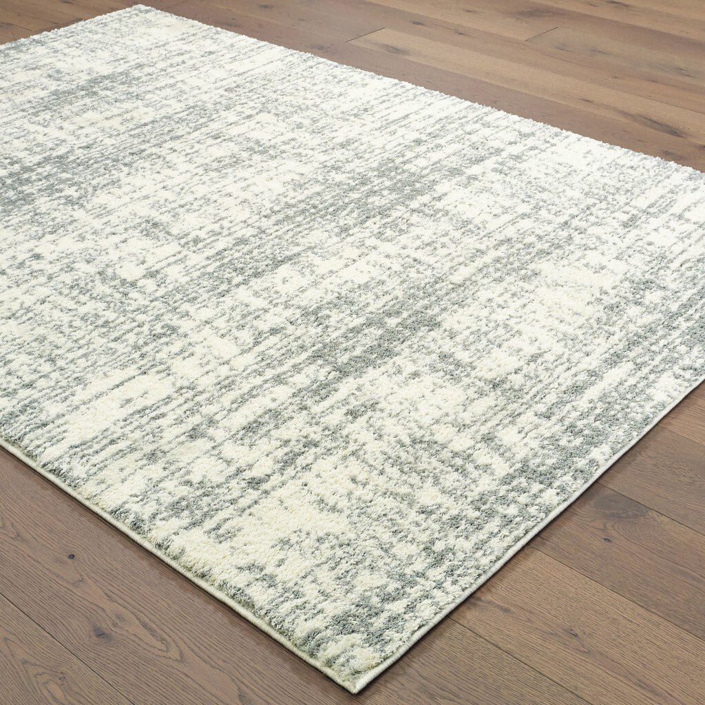 7'X10' Ivory And Gray Abstract Strokes Area Rug