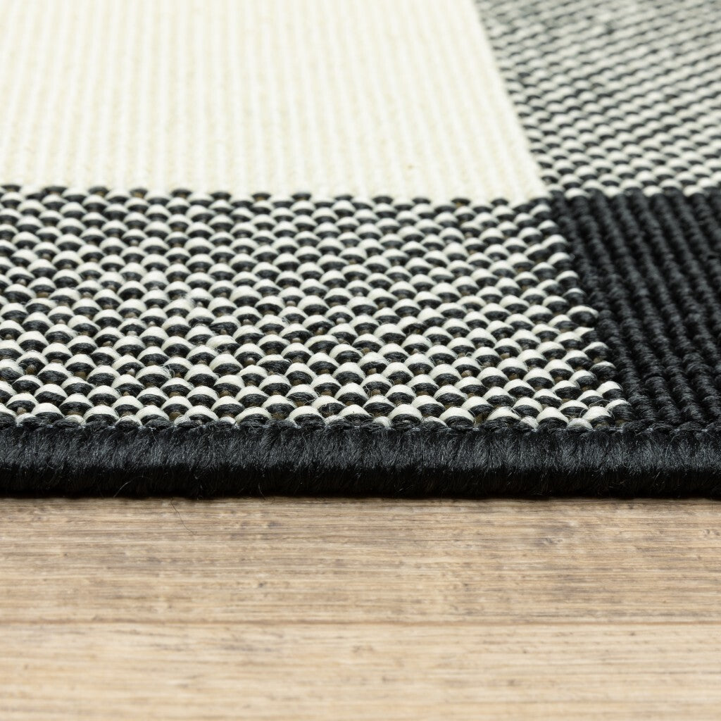 9'X13' Black And Ivory Gingham Indoor Outdoor Area Rug