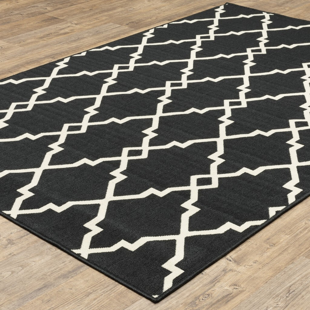 2'X8' Black And Ivory Trellis Indoor Outdoor Runner Rug