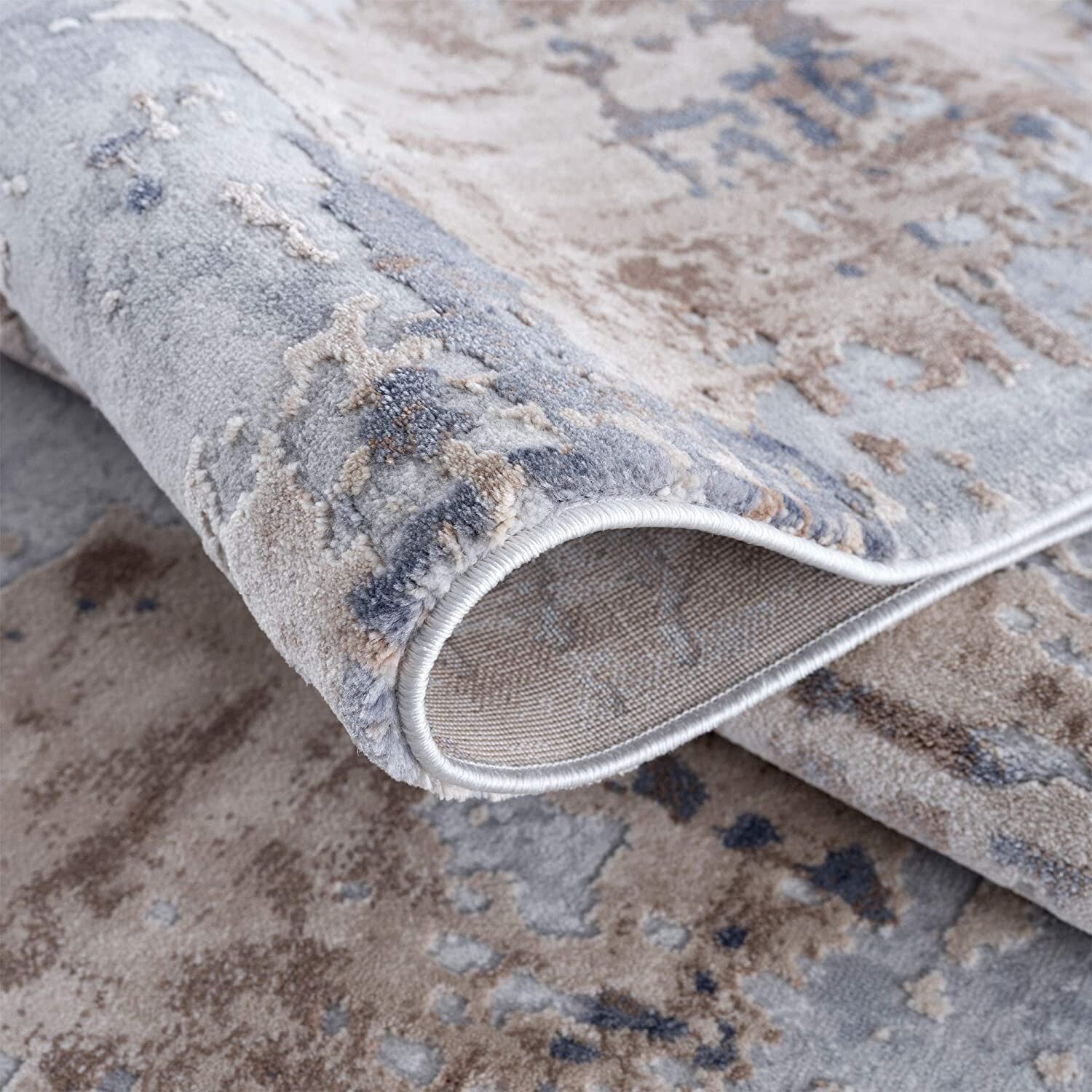 3' X 5' Beige And Ivory Abstract Area Rug