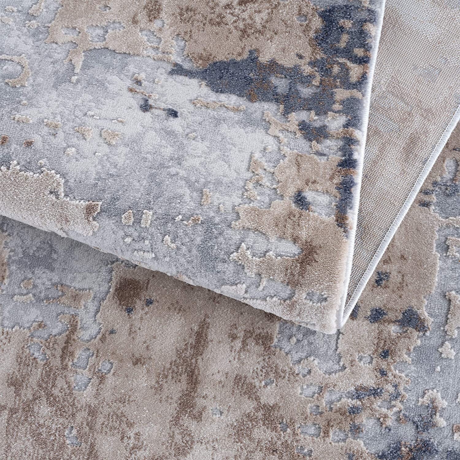 3' X 5' Beige And Ivory Abstract Area Rug