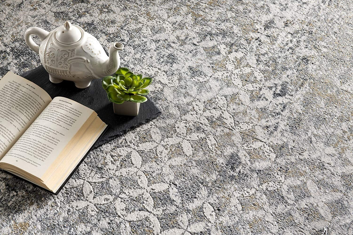 5' X 8' Gray And Ivory Distressed Area Rug