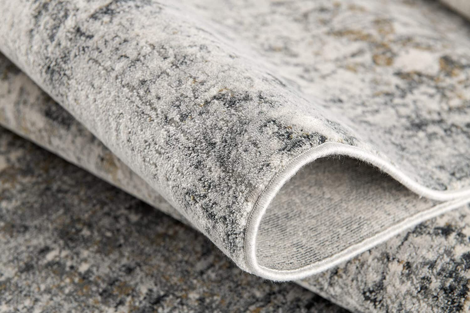 5' X 8' Gray And Ivory Distressed Area Rug