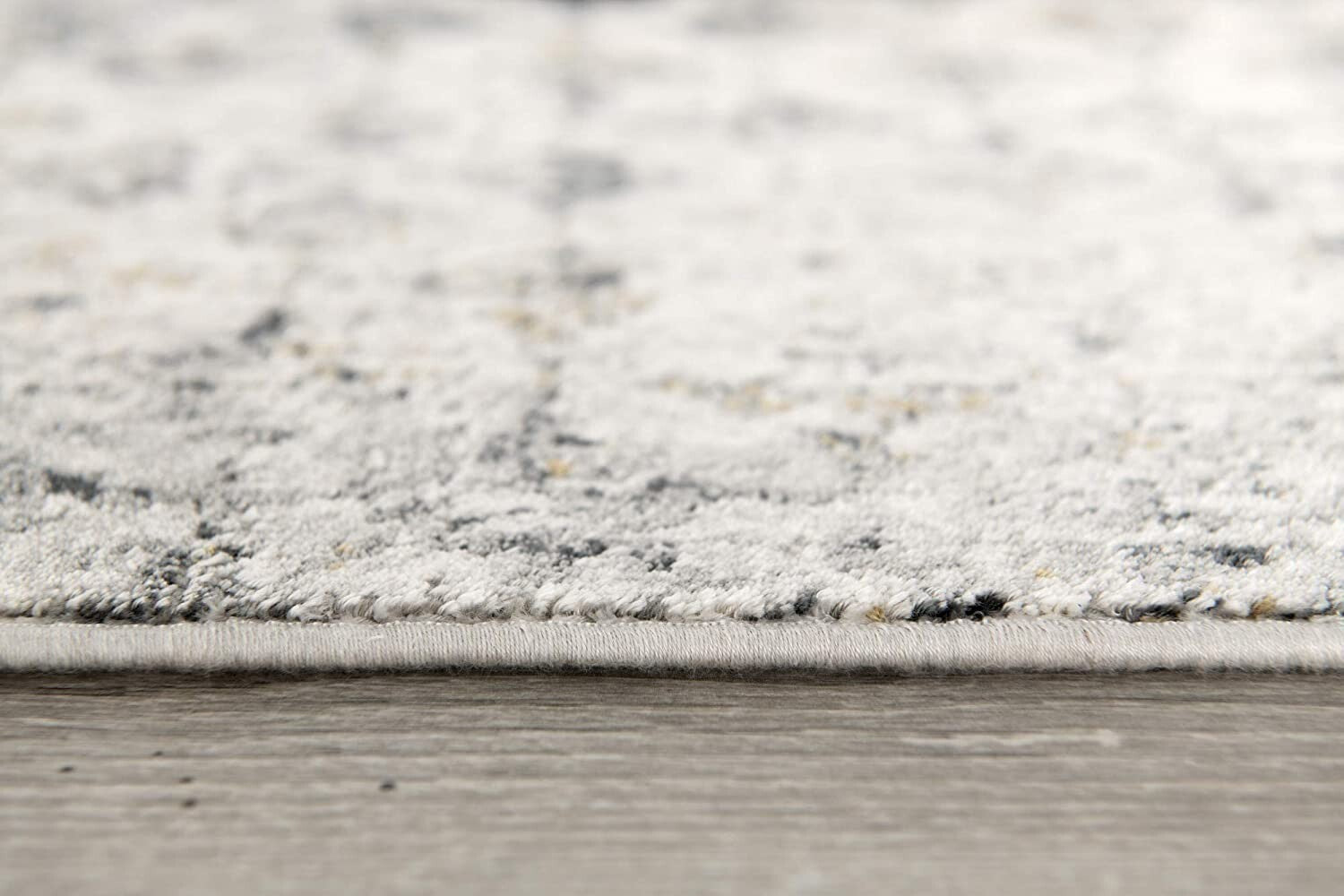 5' X 8' Gray And Ivory Distressed Area Rug
