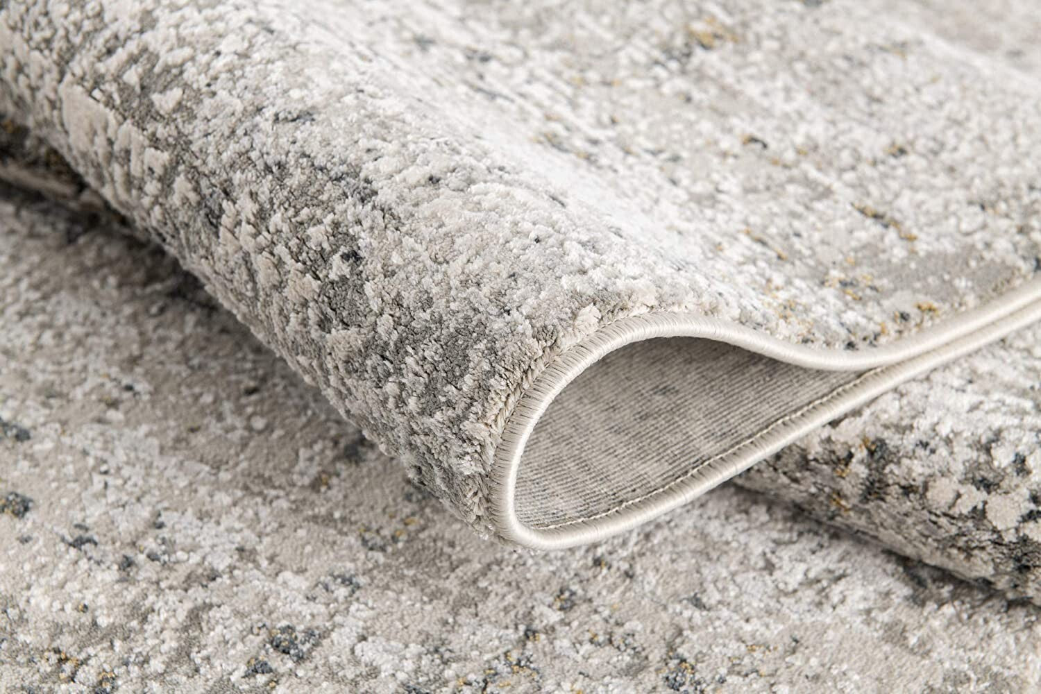 7' X 10' Gray And Ivory Abstract Distressed Area Rug