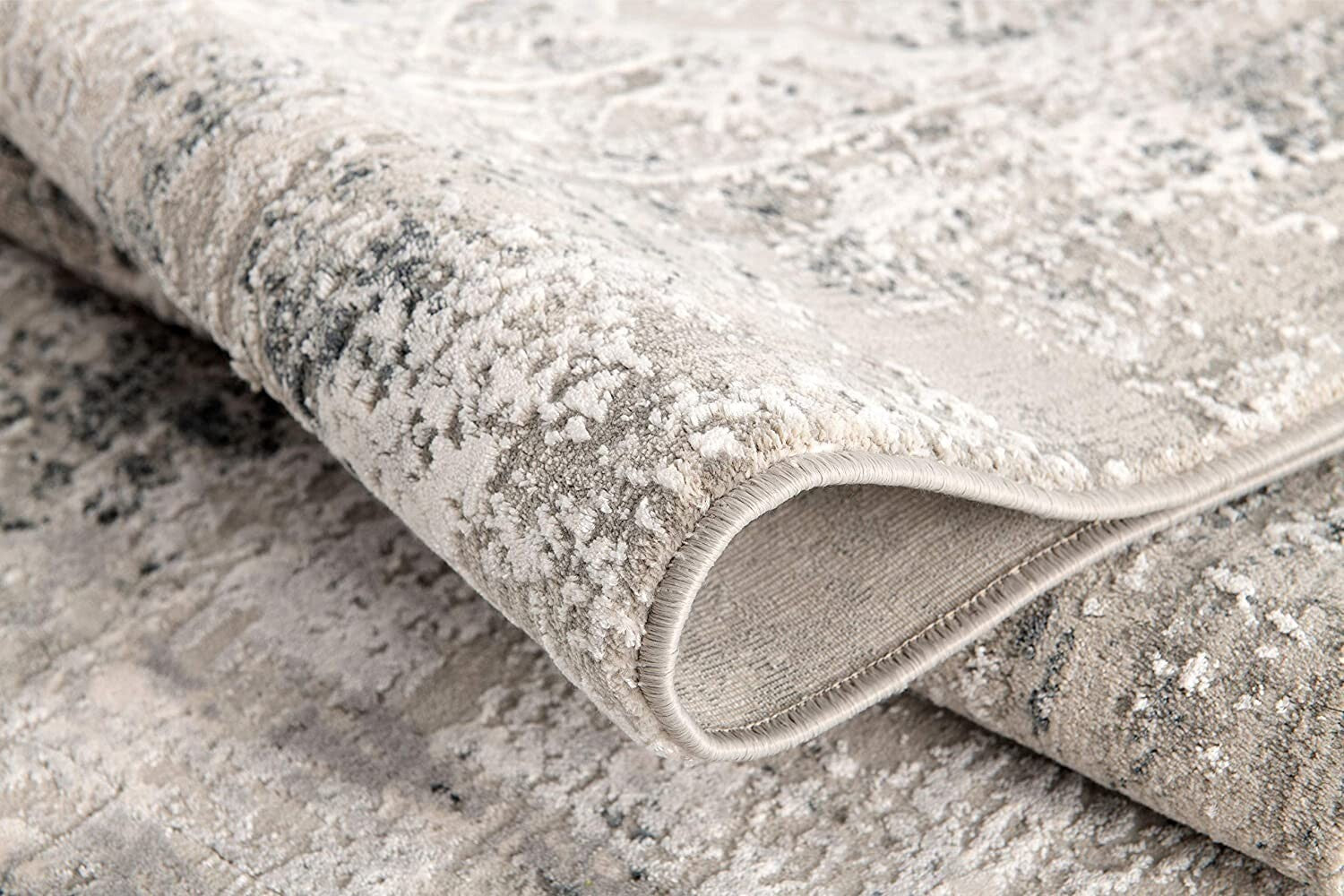 7' X 10' Gray And Ivory Abstract Distressed Area Rug