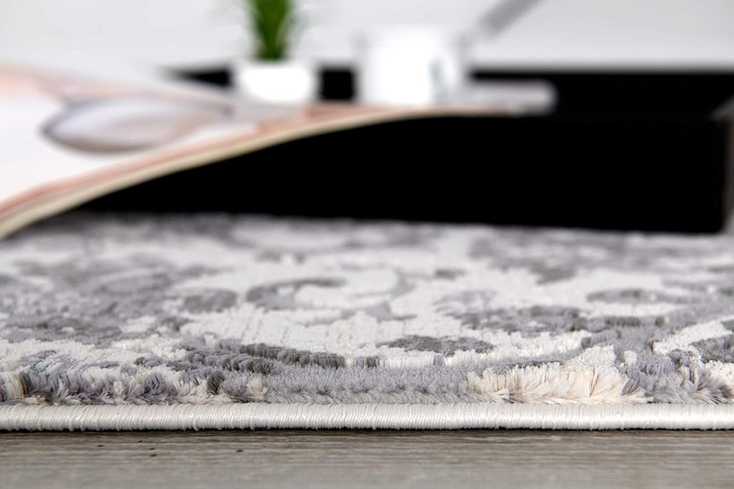 8' X 11' Cream And Gray Faded Filigree Area Rug