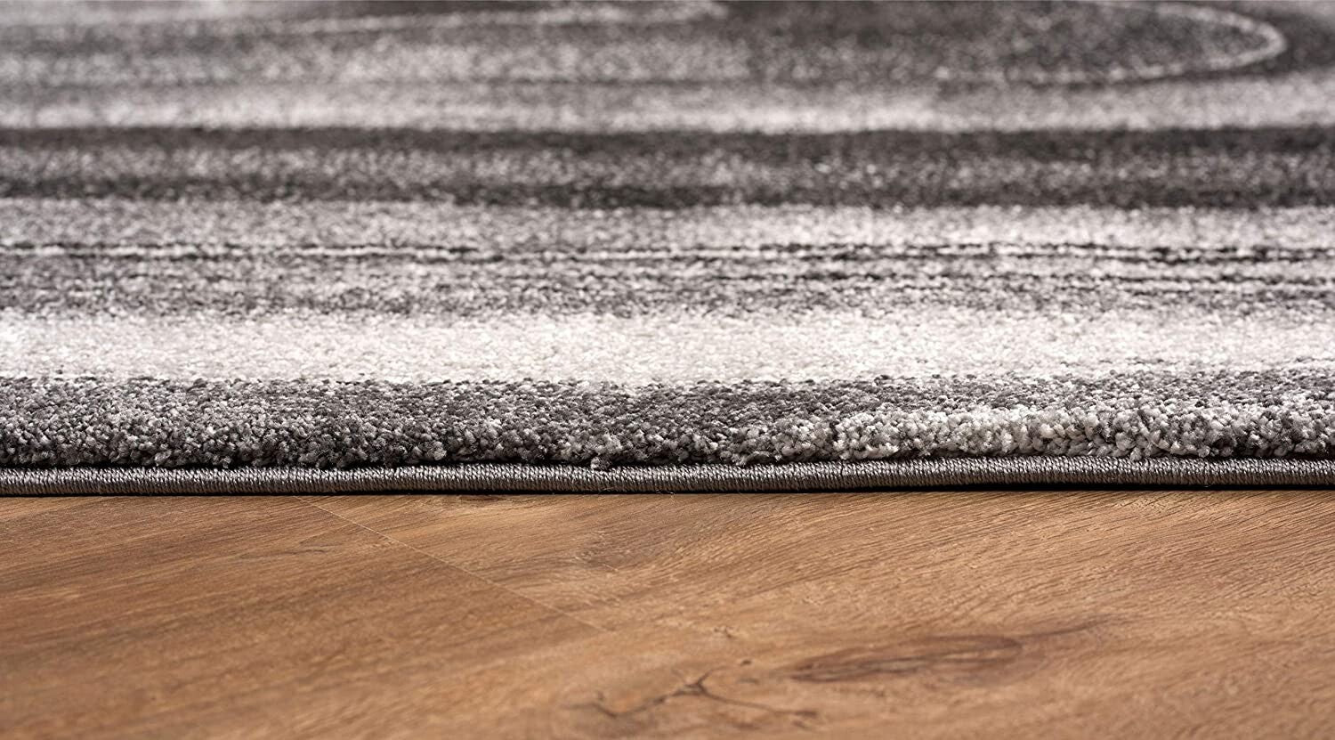5' x 8' Dark Gray Abstract Illusional Area Rug
