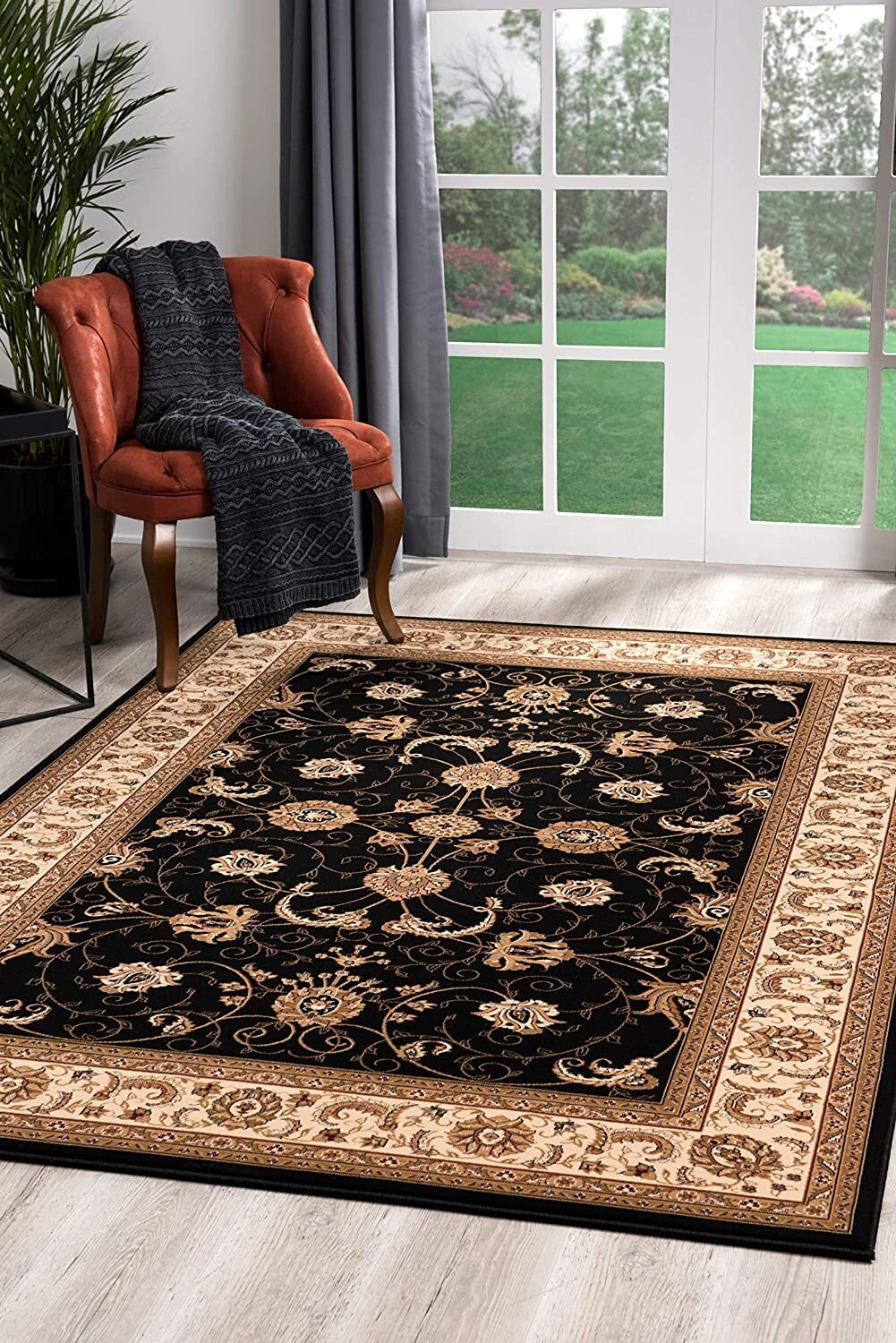7' x 9' Black and Tan Floral Vines Area Rug