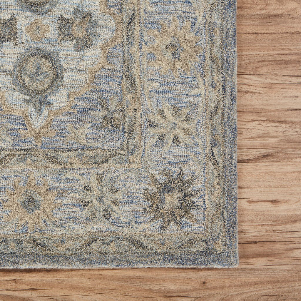 8' x 10' Blue and Tan Traditional Area Rug