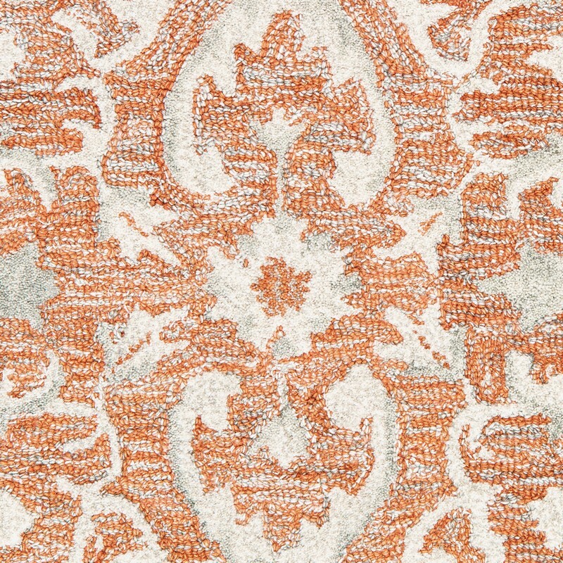 9' x 12' Orange and Ivory Medallion Area Rug
