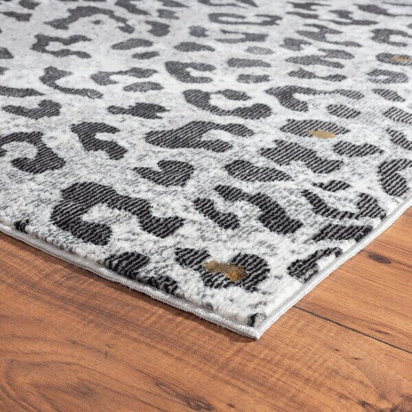 5' x 8' Black and Gray Animal Print Area Rug