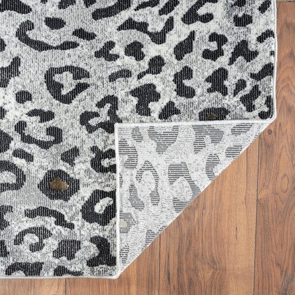 5' x 8' Black and Gray Animal Print Area Rug