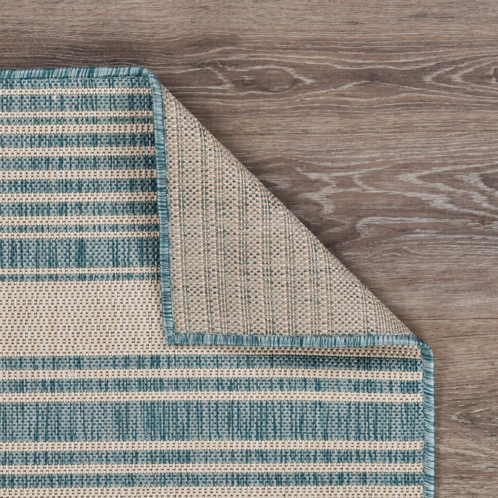 8' x 10' Teal Uneven Striped Indoor Outdoor Area Rug
