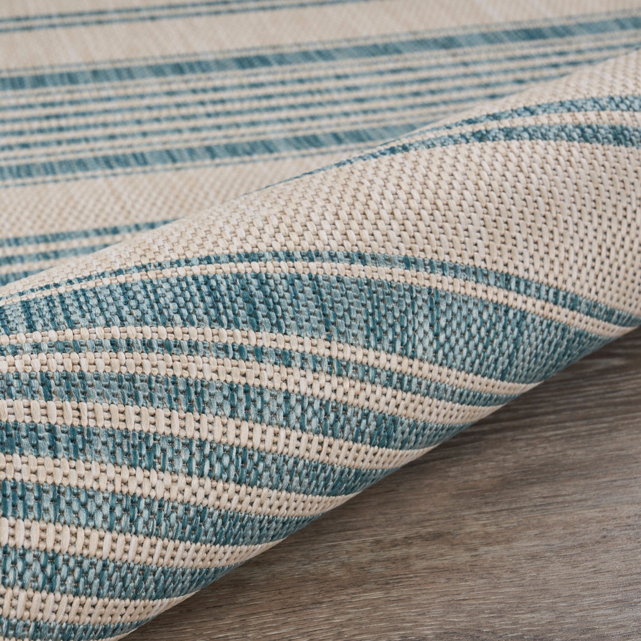 8' x 10' Teal Uneven Striped Indoor Outdoor Area Rug